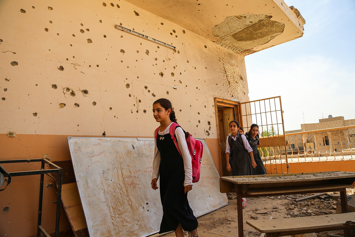 Fatima and friends leave school in Fallujah, Iraq. One in five schools across the country were closed due to conflict (UNICEF/Wathiq Khuzaie).