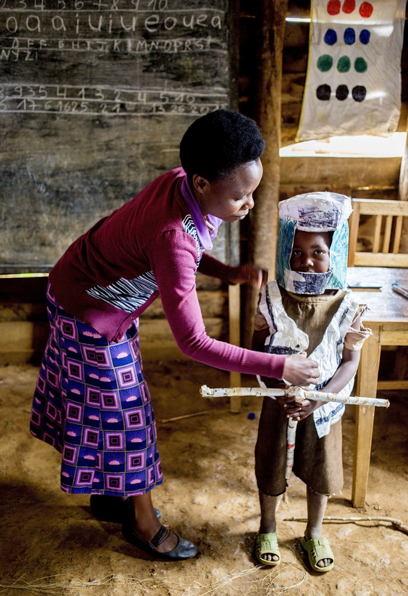 Even though she doesnât have many resources at her disposal, teacher Josephine looks for ways to use discarded material to make learning aids to help develop young minds. Â©VSO/Alice Kayibanda